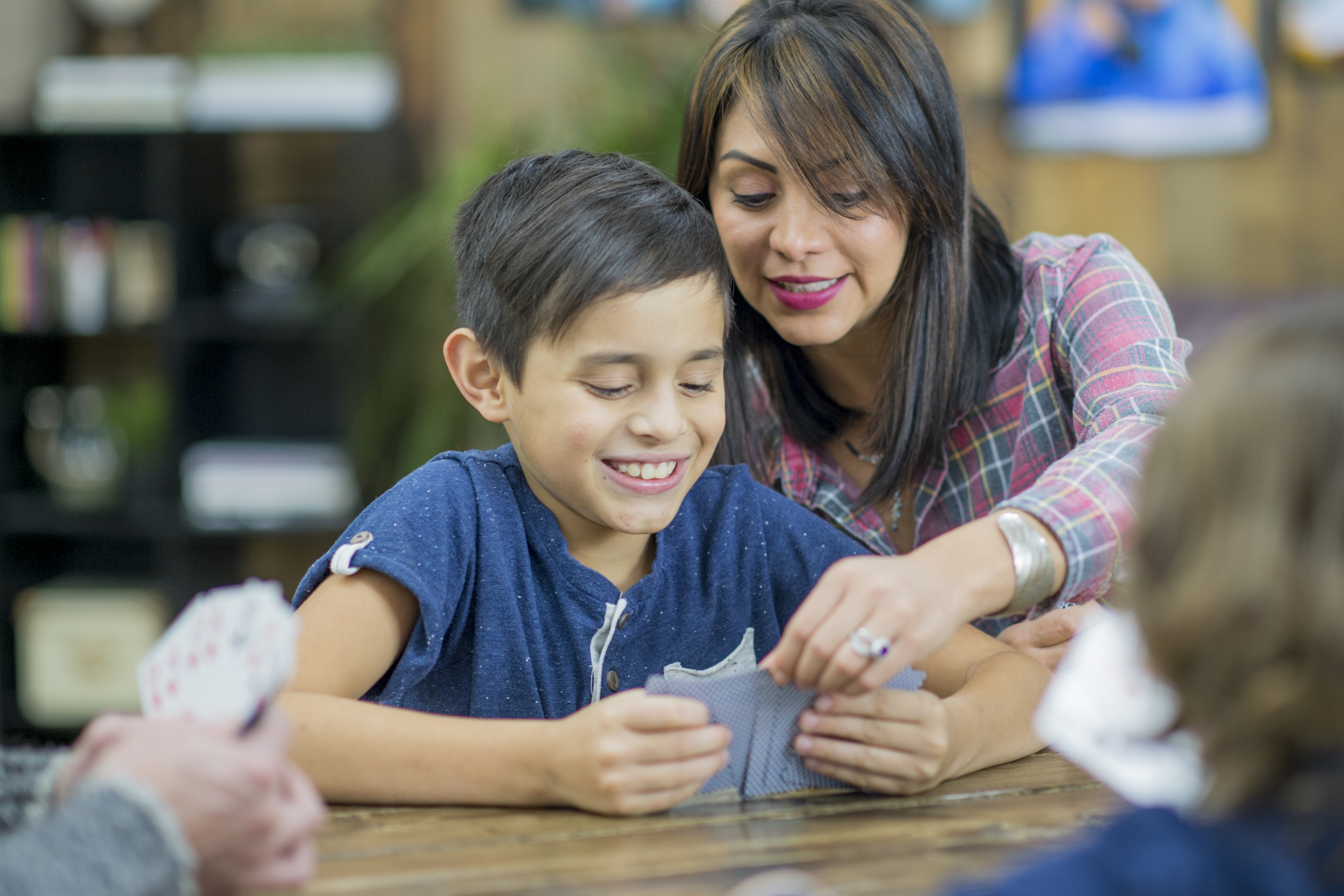 Elementary teacher helping student with math at home